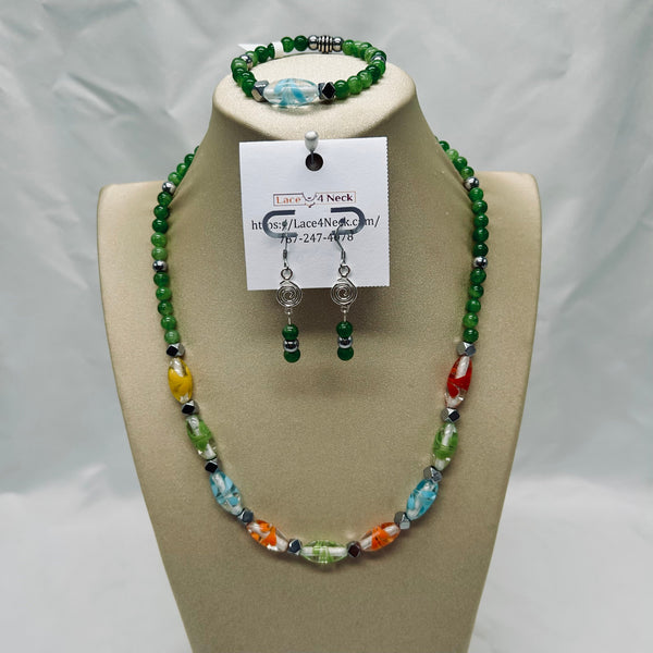 Beaded necklace, bracelet, and earrings set on a mannequin bust with a visible brand card.