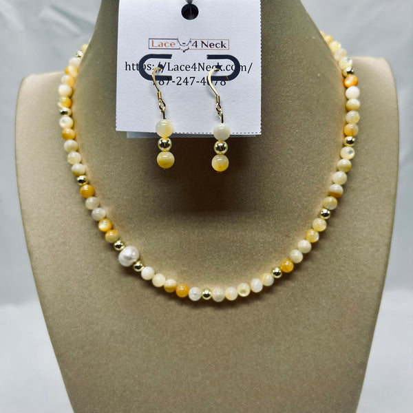 Pearl necklace and earrings set on a mannequin bust with 'Lace & Neck' label.