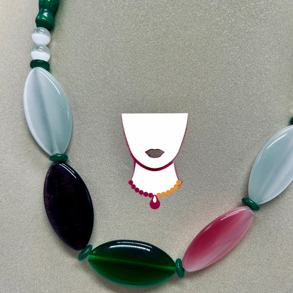 Colorful beaded necklace on a gray background