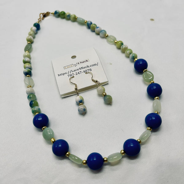 Beaded necklace with blue and green stones on a white background, accompanied by a card displaying a website URL.