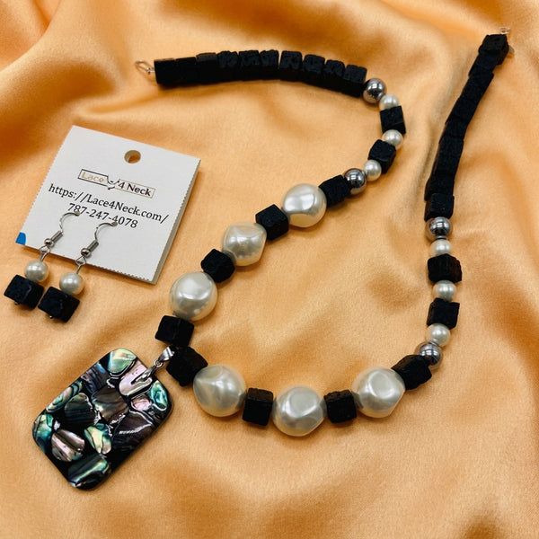 “Basalto,” Pava Shell, Glass Pearls, and Lava necklace