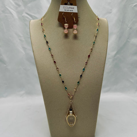 Necklace and earrings set on a mannequin bust with a white background