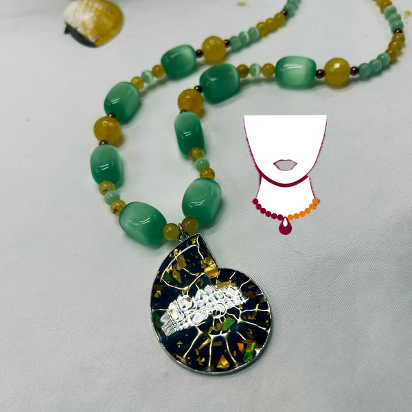 “Creature,” Ammonite, Cat Eye, & Yellow Aventurine necklace