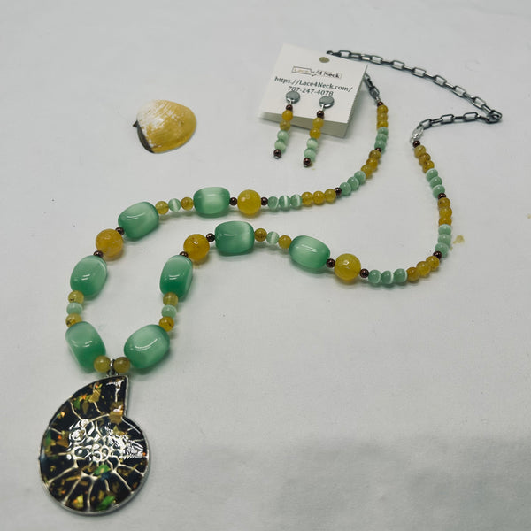 “Creature,” Ammonite, Cat Eye, & Yellow Aventurine necklace