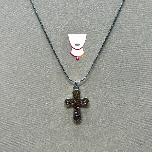 Cross pendant necklace on a gray background