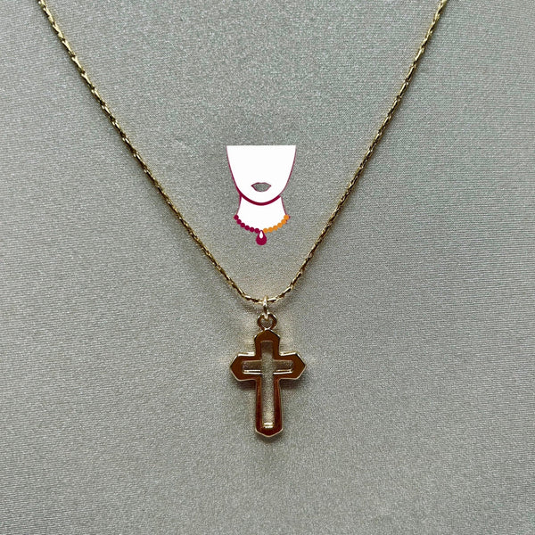 Necklace with a cross pendant on a gray background