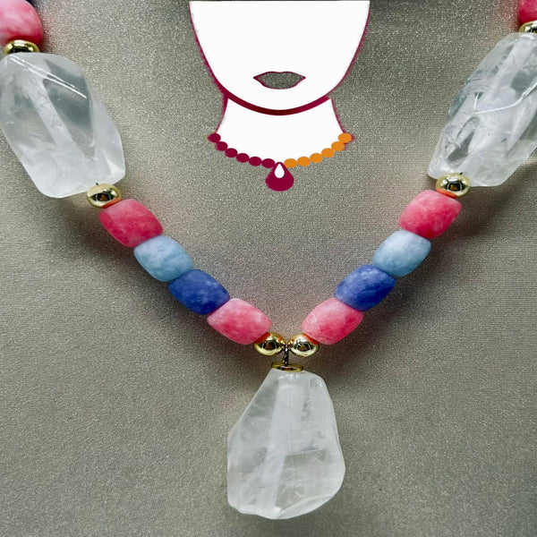 Necklace with colorful beads and clear crystal-like elements on a neutral background
