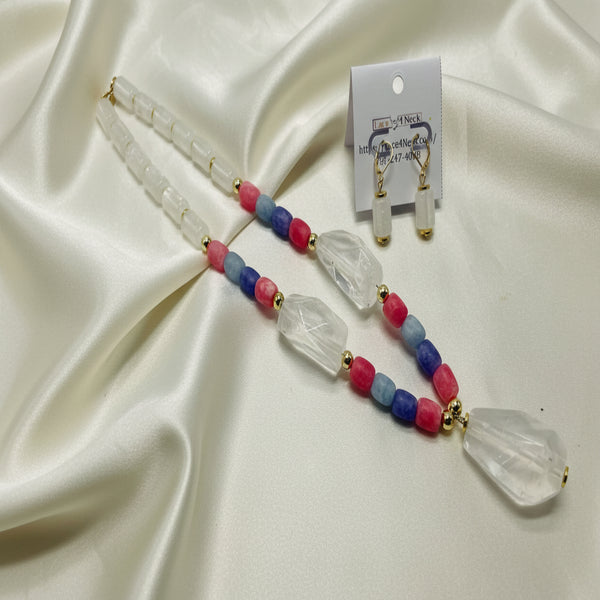 Necklace and earrings set with beads on a white background