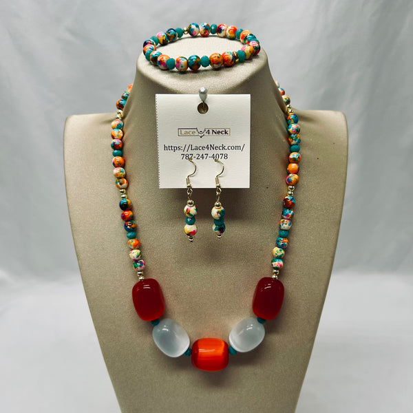 Jewelry set including necklace, bracelet, and earrings on a mannequin bust with a visible brand tag.