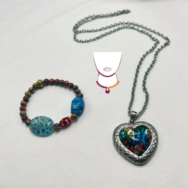 Necklace with heart-shaped pendant and beaded bracelet on a white background