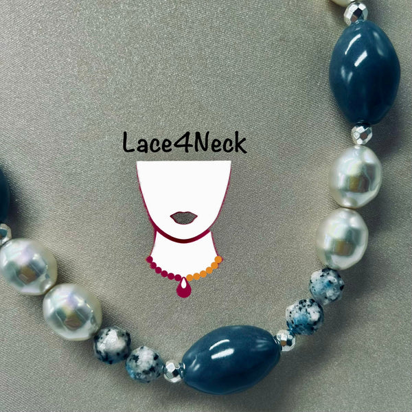 A beaded necklace with dark blue oval beads, white pearl-like round beads, and marbled blue-and-white spacer beads, shown on a gray textured background with a Lace4Neck logo overlay.