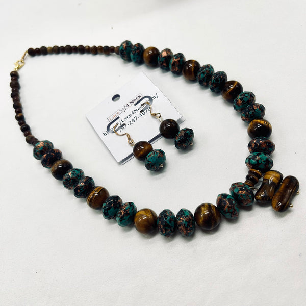 Beaded necklace with a matching earring set on a white background