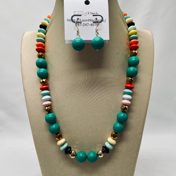 Colorful beaded necklace and earrings on a mannequin bust with a visible brand tag.