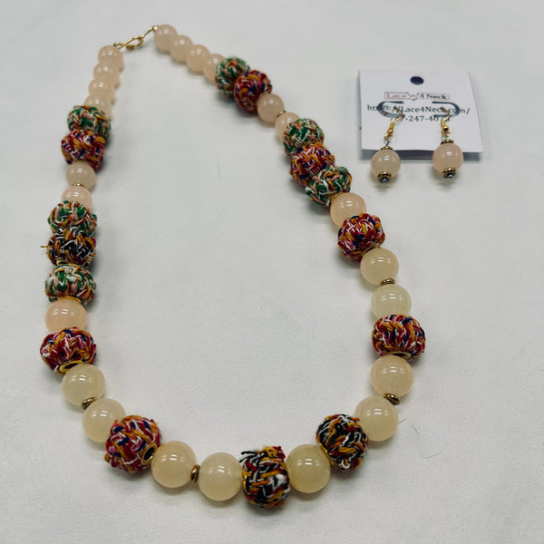 Necklace with multicolored beads on a white background