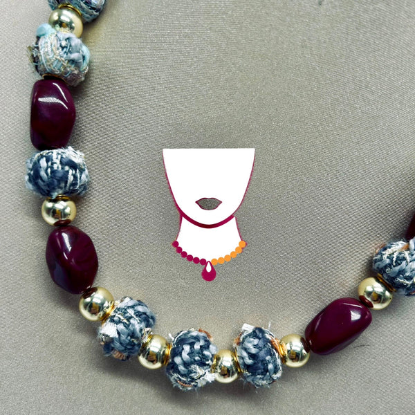 Necklace with beads on a gray background with a small illustration of a bonnet.