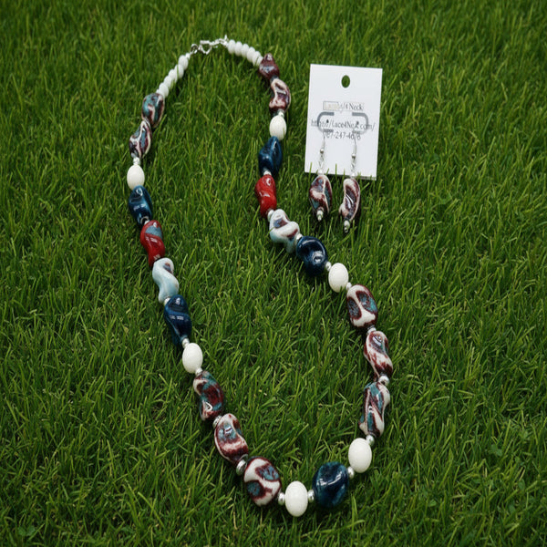 Necklace with multicolored beads and a card on a white background