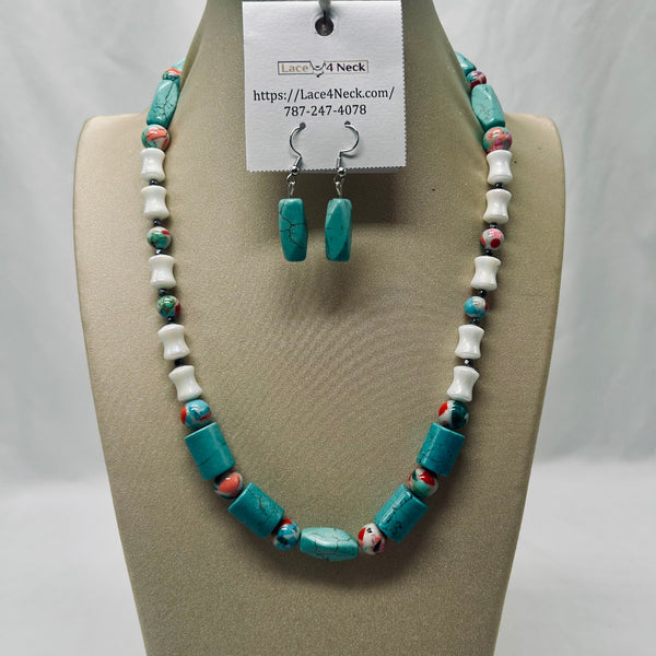 A turquoise and white beaded necklace with matching drop earrings displayed on a beige jewelry bust. The necklace features a mix of turquoise, white, and small coral-red patterned beads, with a white paper tag attached at the top reading 'Lace4 Neck'.
