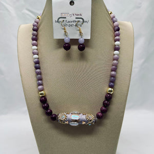 Necklace and earrings set on a mannequin bust with 'Lace4Neck' tag.