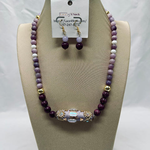 Necklace and earrings set on a mannequin bust with 'Lace4Neck' tag.