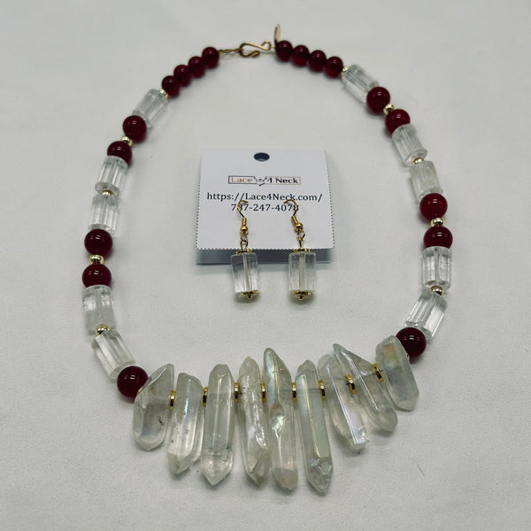 Necklace with clear beads and red accents, accompanied by earrings and a business card on a white background.