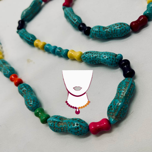 Colorful beaded necklace on a white background