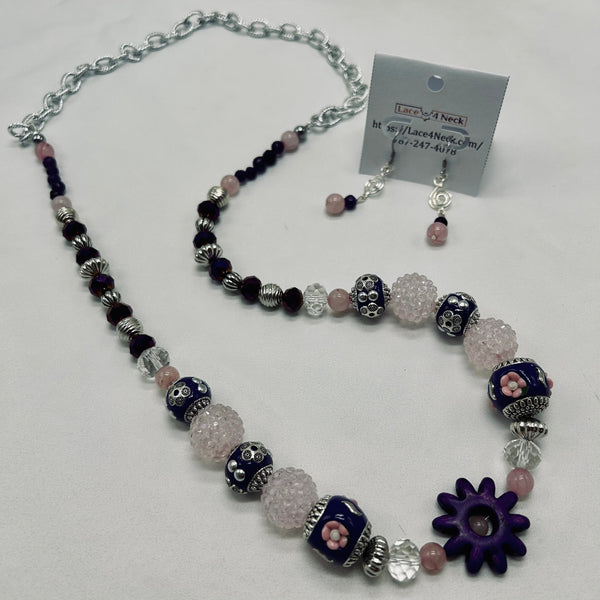 Beaded necklace with colorful beads on a white background