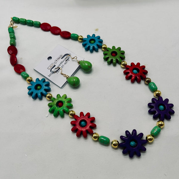 Colorful necklace with flower-shaped beads on a white background