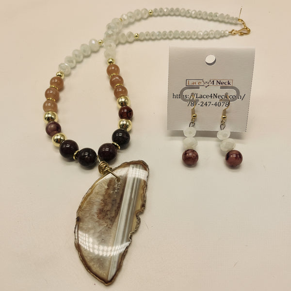 Jewelry set with necklace and earrings on a white background