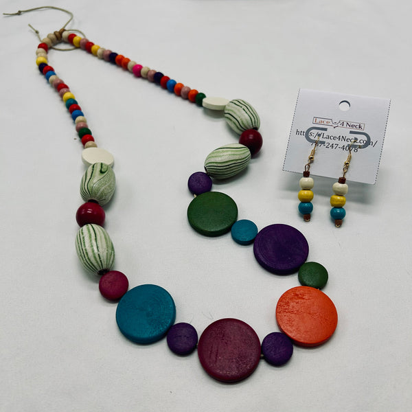 Colorful necklace and earrings on a white background with a business card.