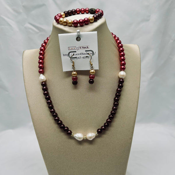 Beaded necklace, bracelet, and earrings set on a mannequin bust with a white background