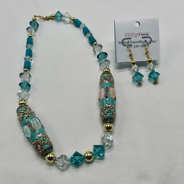 Turquoise beaded necklace and earrings with a card on a white background